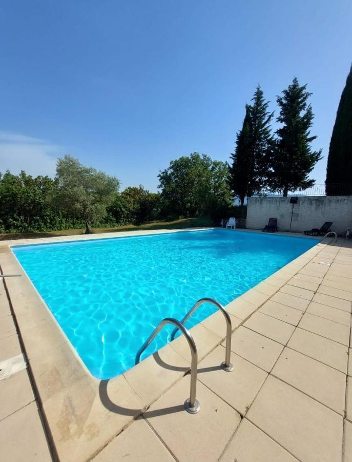 superbe logement au cœur Luberon proche du Colorado provencal dans une résidence au calme avec piscine, magnifique vu sur le Luberon depuis la terrasse Viens Esterno foto